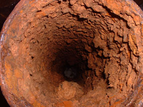 inside of a badly corroded pipe